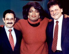 Oprah with Rick's client, Dr. C.P, Chambers